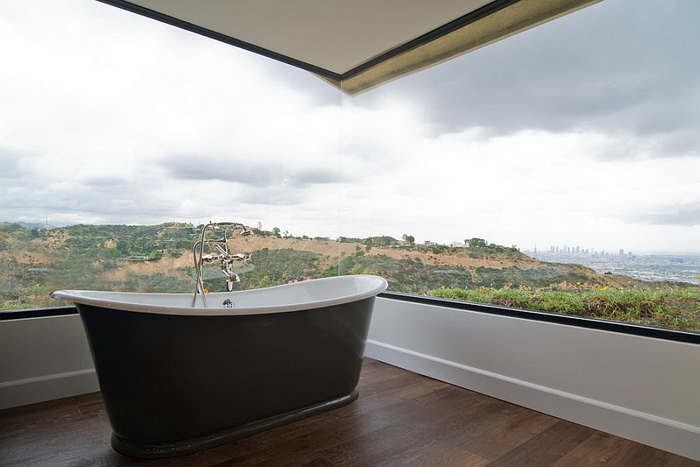 stunning-corner-window-brings-the-magic-of-landscape-outside-indoors