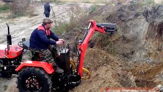 Экскаватор Уралец с погрузочным ковшом
